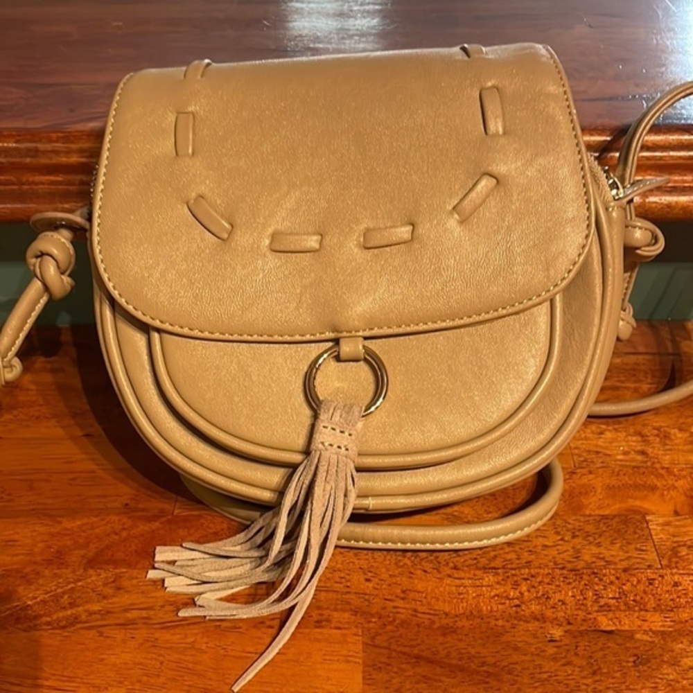 Lionel Designer Crossbody purse with fringe accent in camel color